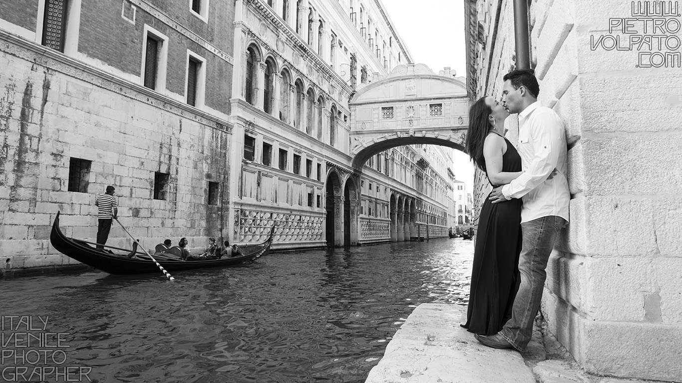 Photographer in Venice Italy for a vacation photo shoot during a walking tour and gondola ride - romantic and fun couple photo walk in Venice