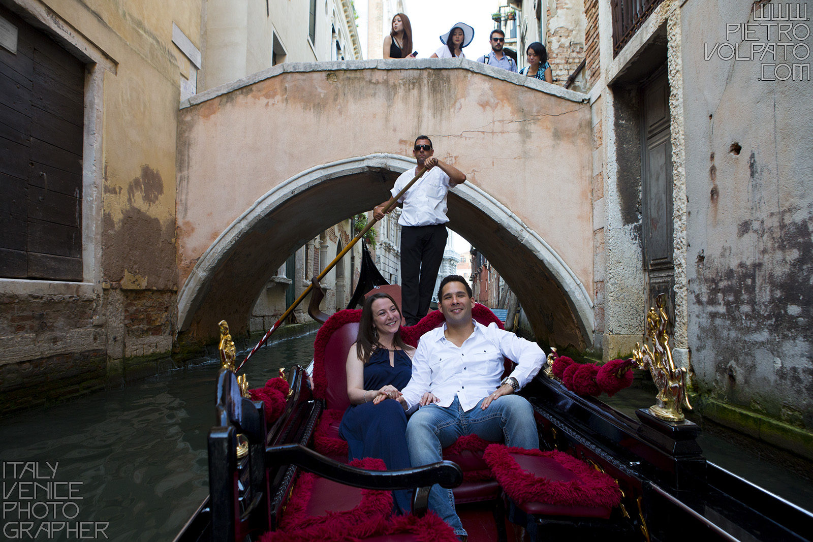 Photographer in Venice Italy for a vacation photo shoot during a walking tour and gondola ride - romantic and fun couple photo walk in Venice