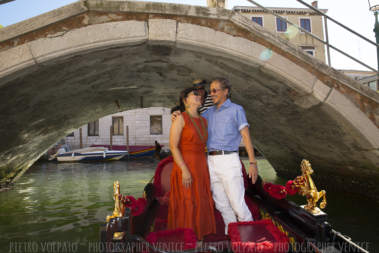 Photographer in Venice for romantic and fun photo shoot during a walking tour and gondola ride ~ Venice couple photo session