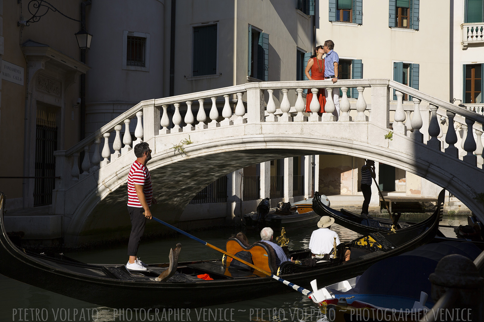 Photographer in Venice for romantic and fun photo shoot during a walking tour and gondola ride ~ Venice couple photo session