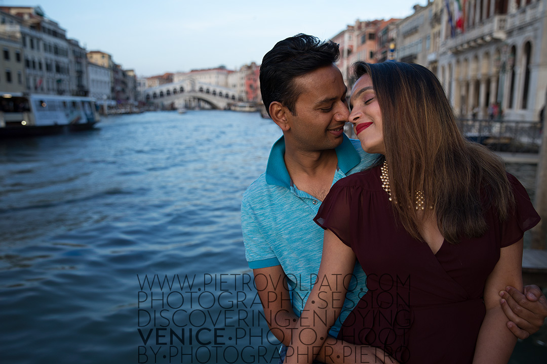 Venice photographer for a vacation photo shoot and tour. Romantic and fun photos of a couple in Venice during a photo walk and gondola ride.